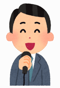 マイクを持つ司会者