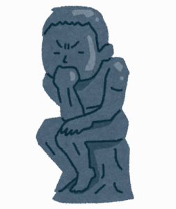 考える人
