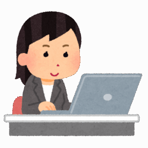 PCの前の女性